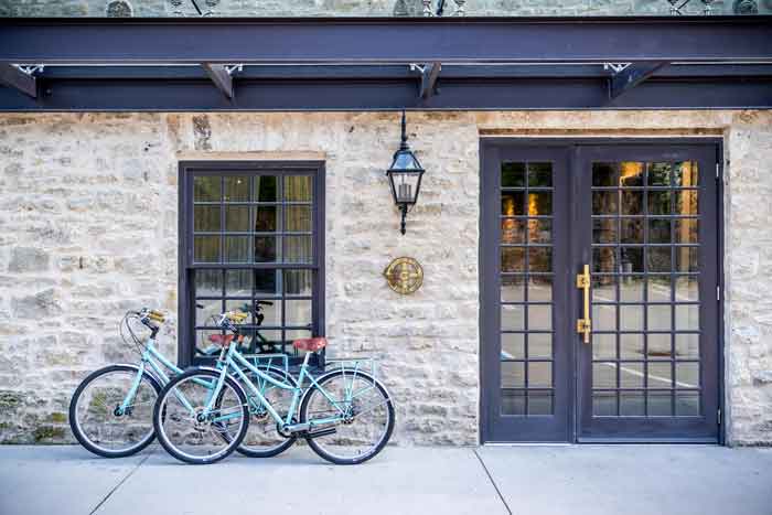 Bicycles at the front entrance of the Elora Mill Hotel & Spa